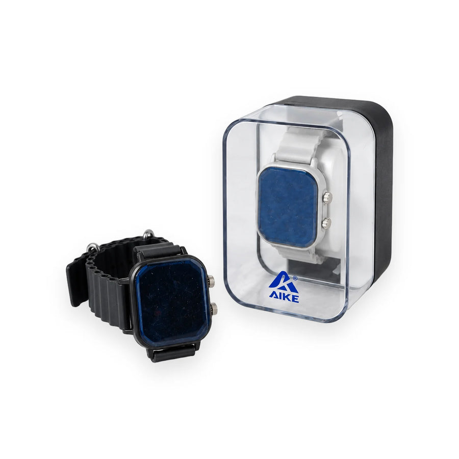 Black Aike LED digital watch with a square face and ribbed strap beside its clear display case
