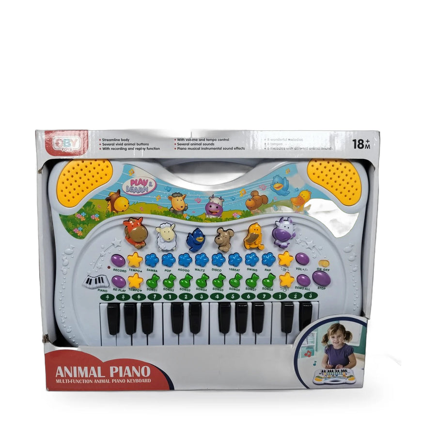 White animal piano keyboard with black and white keys and colourful animal buttons