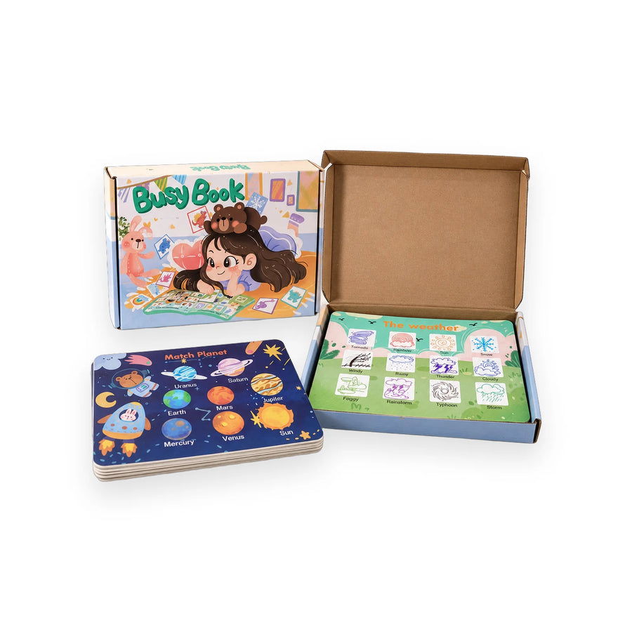 Busy Book activity book open at the planets matching page, beside its box