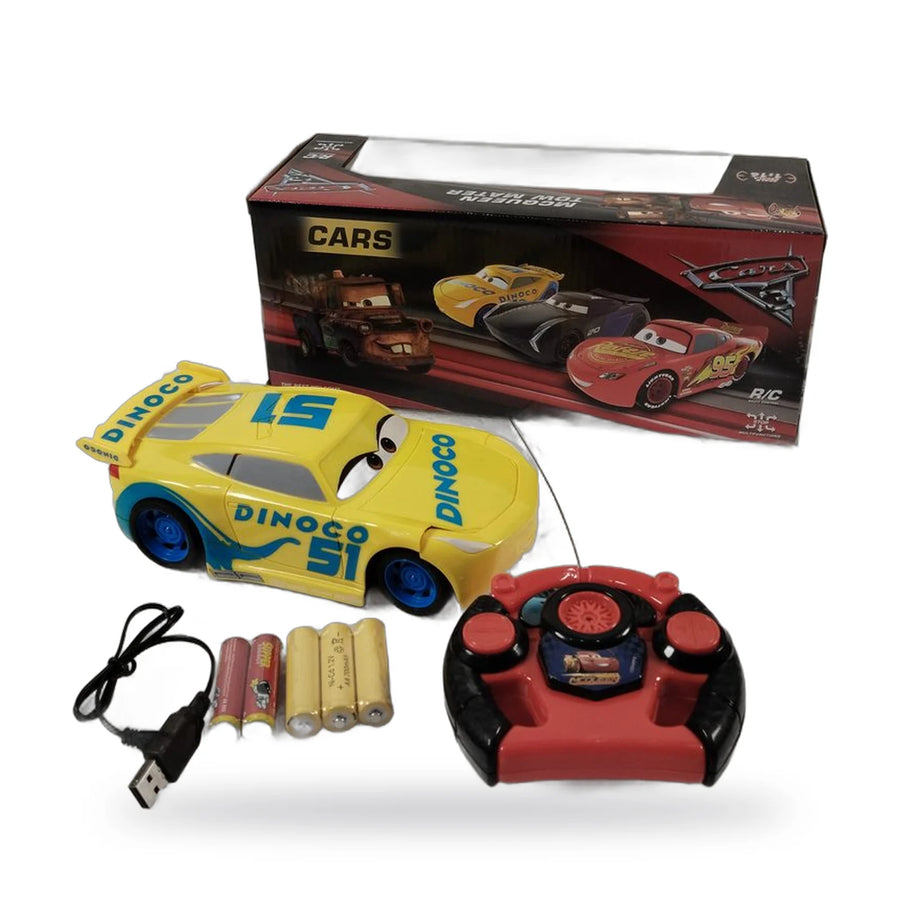 Yellow Cars Dinoco 51 radio control car with its steering-wheel remote and batteries in the packaging