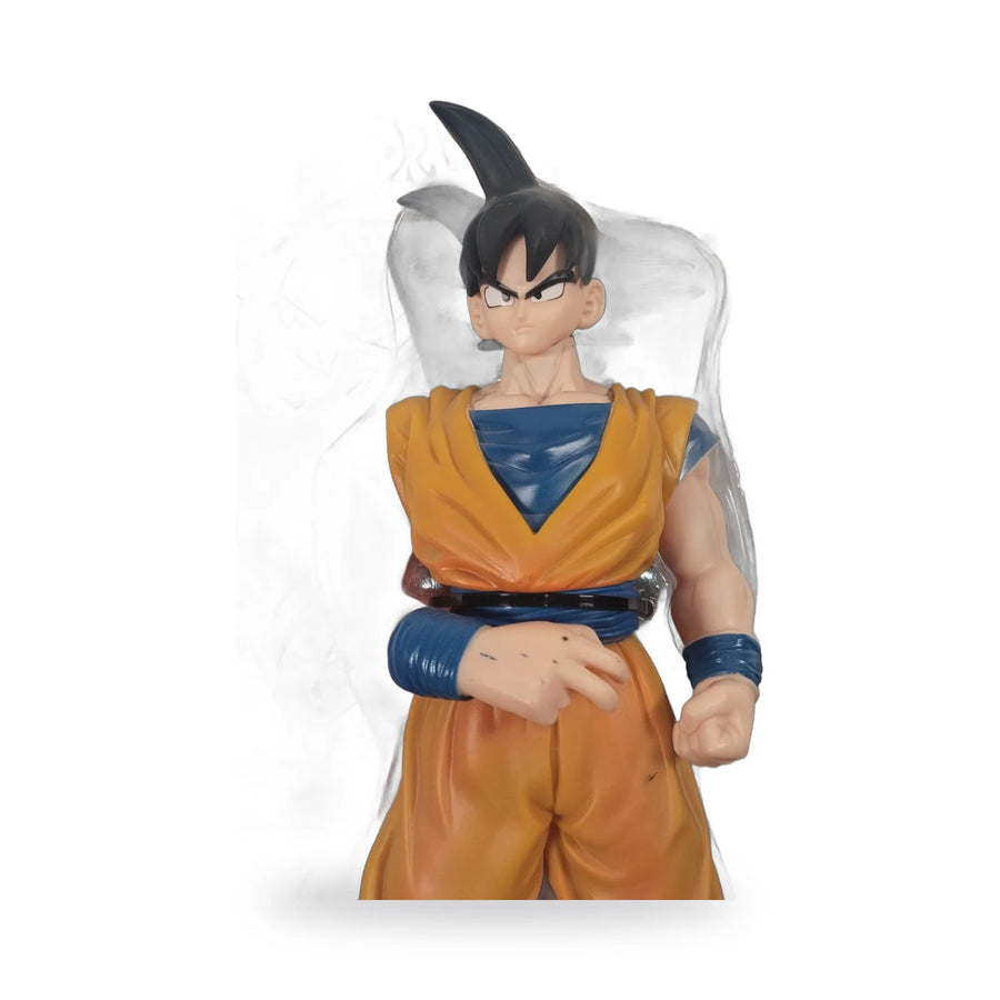 Dragon Ball Z Super Saiyan Goku figure in an orange outfit inside its display box