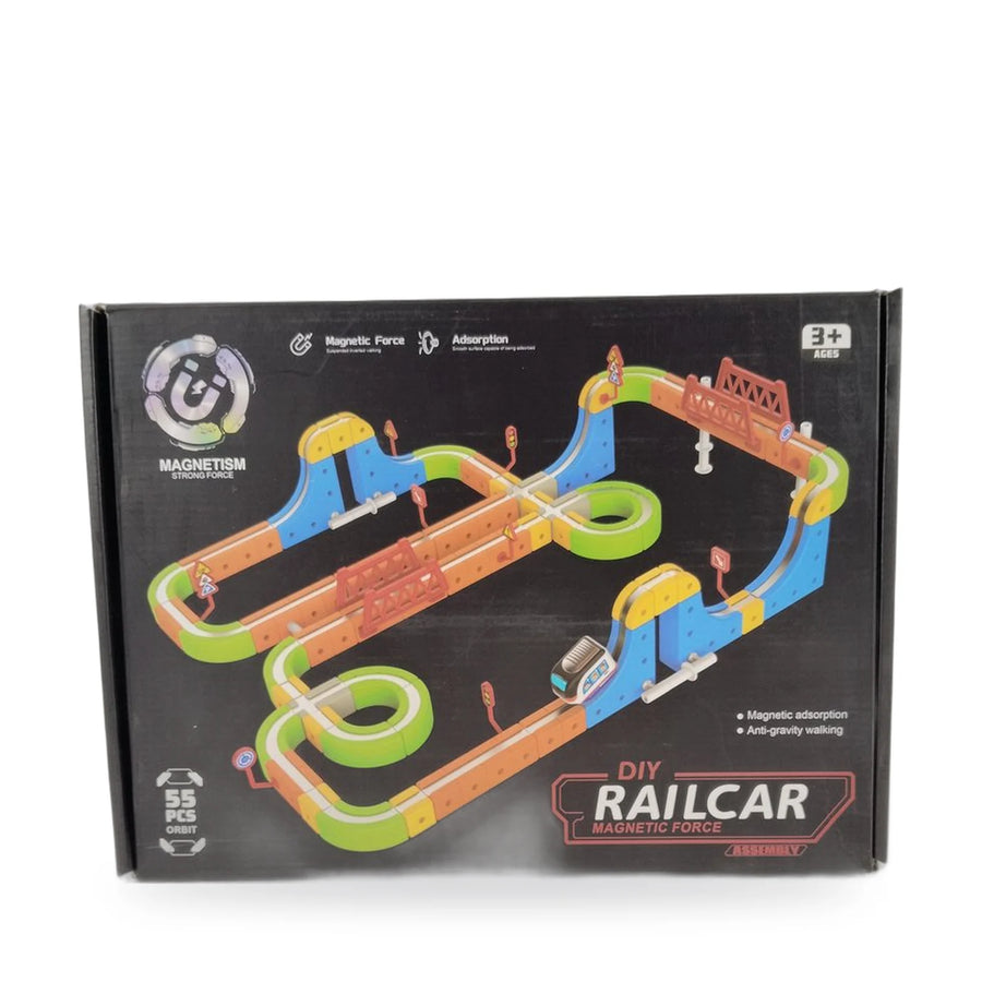 DIY magnetic railcar track set with orange, blue and green track pieces and a bridge