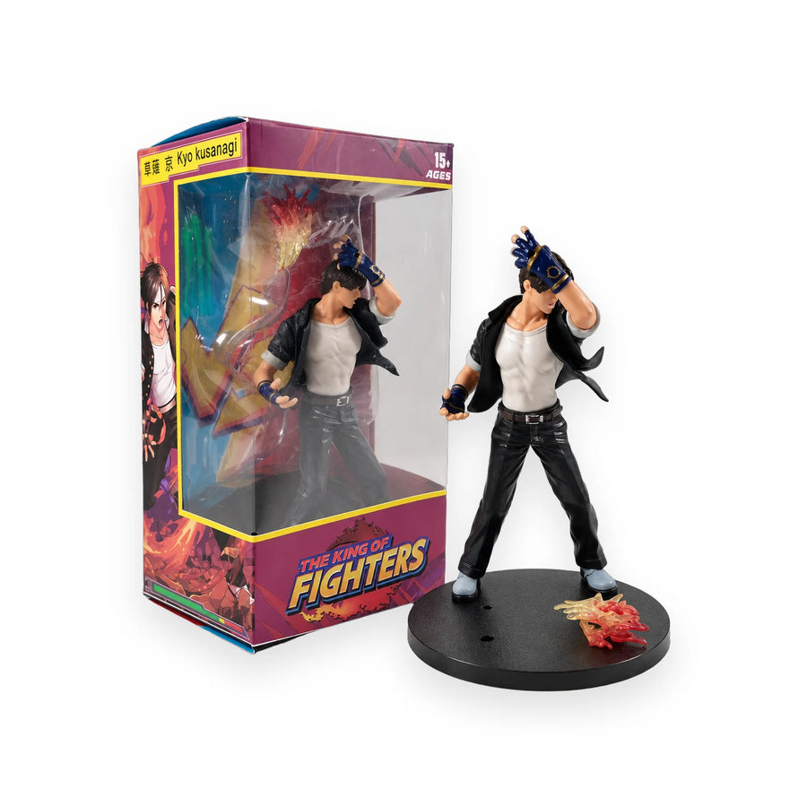 Kyo Kusanagi figure from The King of Fighters on a round black base with a flame effect piece, beside its packaging