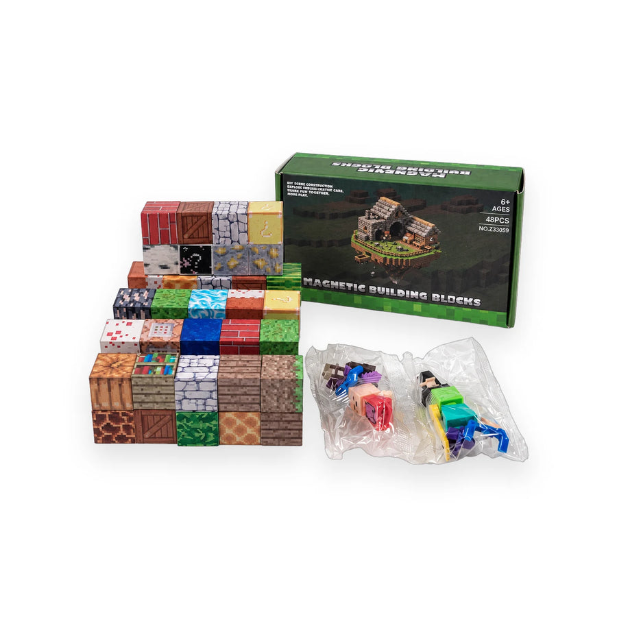 Box of Minecraft-style magnetic building blocks showing an assembled pixel scene and figures