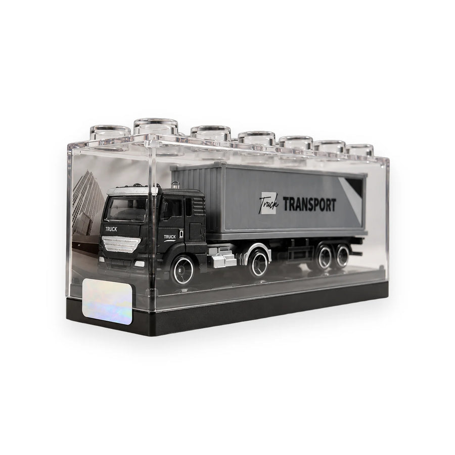 Miniature transport trucks with trailers in blue, black and grey, and red