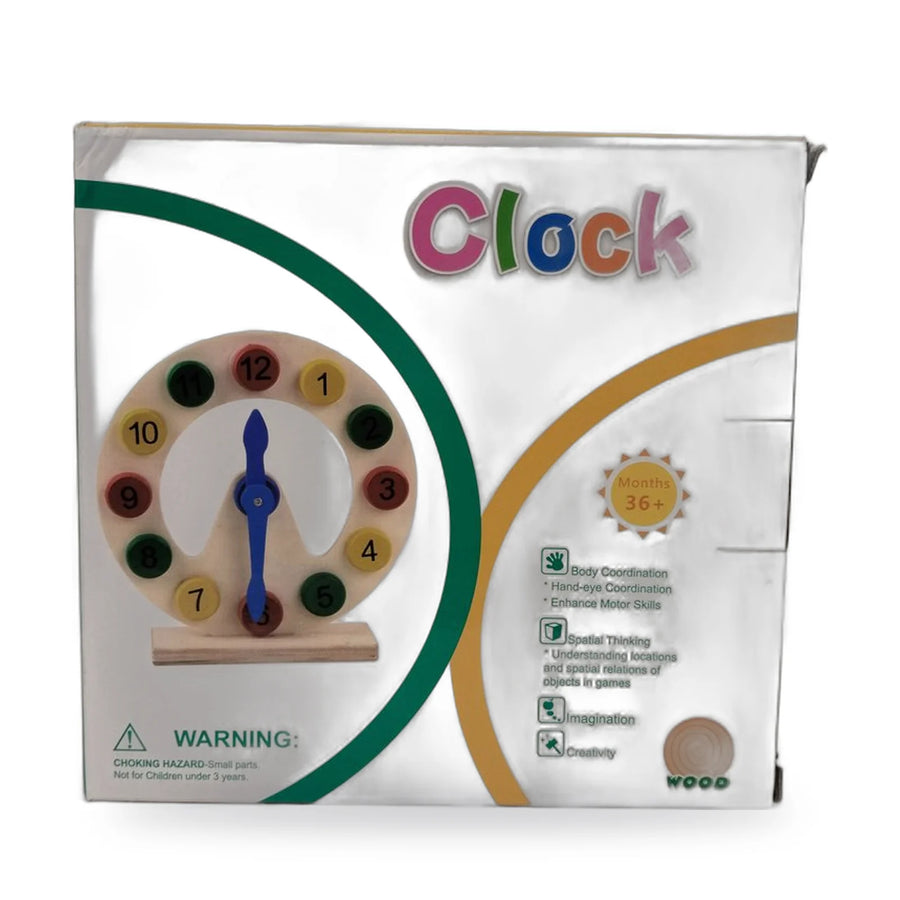 Wooden learning clock toy with removable number discs and blue hands, shown with its packaging
