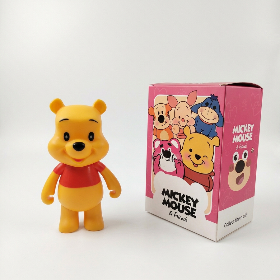 Winnie the Pooh figure and box on white, without plastic tray